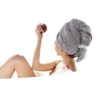 Gray waffle-knit hair towel.