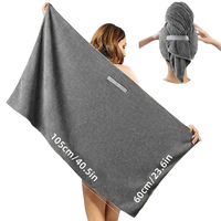 Gray waffle-weave hair towel with dimensions.