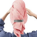 Pink waffle-weave hair towel.