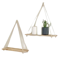 Rustic hemp hanging floating plant shelf with two wooden swing shelves for a cozy vibe