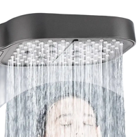 Gray shower head with water flowing.