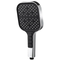 Chrome and black handheld shower head.