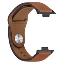 Brown leather watch band with black connectors.