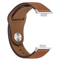 Brown leather watch band with silver connectors.
