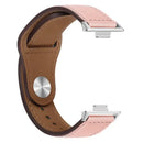 Pink and brown leather watch band.