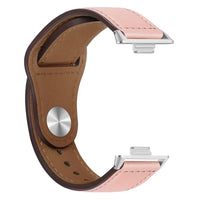Pink and brown leather watch band.