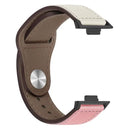 Two-toned leather watch band.