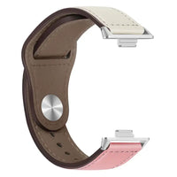 Two-tone leather watch band.