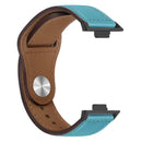 Turquoise and brown leather watch band.