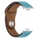 Turquoise and brown leather watch band.