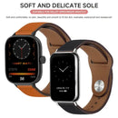 Two smartwatches with leather straps.