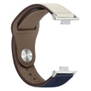 Two-toned leather watch band.