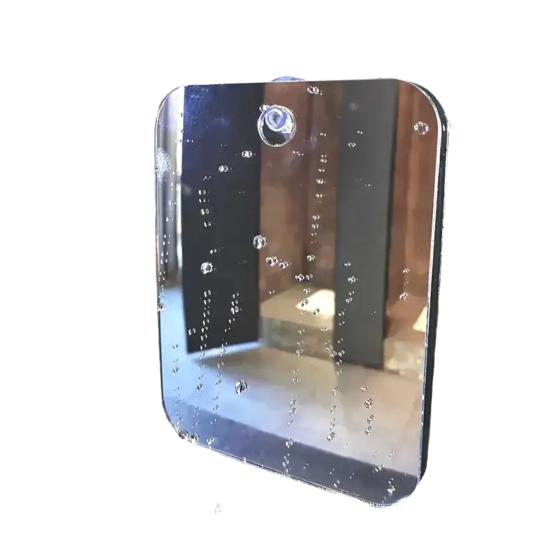 Rectangular clear mirror with suction cup.