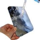 Shiny phone under running water.