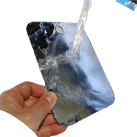 Shiny phone under running water.