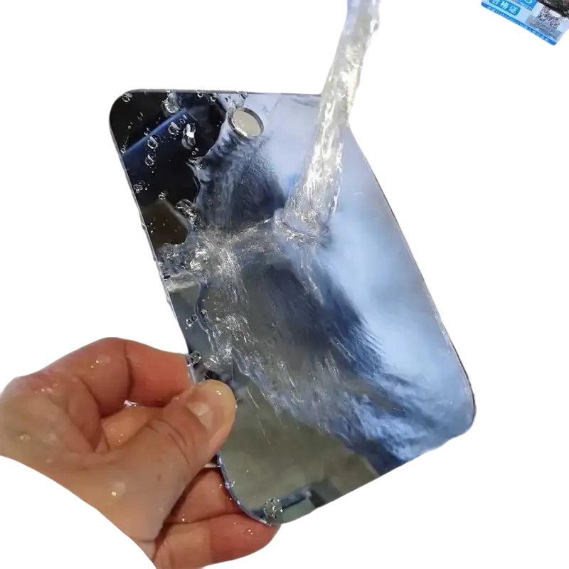 Shiny, reflective phone under running water.