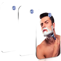 Three suction-cup shaving mirrors.