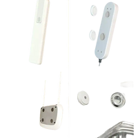 White adhesive mounting pads for Magnetix Wall Hooks and remote organizers