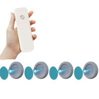 Magnetic remote control holders with Magnetix Wall Hooks, a trendy invisible key organizer