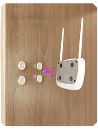 White router with antennas shown with Magnetix Wall Hooks for a trendy, invisible key organizer