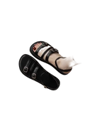 Black leather buckle sandals.