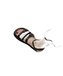Black leather buckle sandals.