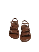 Brown buckled sandals.