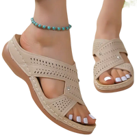Beige perforated comfort sandals.