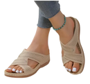 Beige perforated criss-cross sandals.