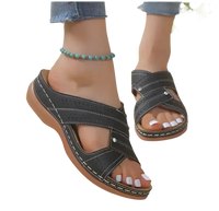 Black orthopedic sandals.