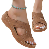 Brown perforated platform sandals.