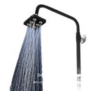 Black square shower head with multiple nozzles.
