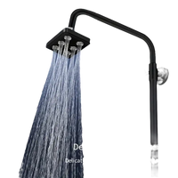 Black square shower head with multiple nozzles.