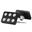 Black square shower head with multiple spray nozzles.