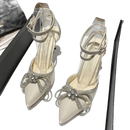 Rhinestone-embellished high heels.