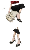 Elegant high-heeled shoes with ankle straps and bow embellishments.