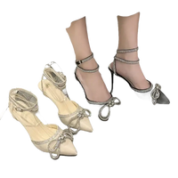 Rhinestone-embellished heeled shoes.