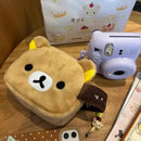 Brown bear plush bag.