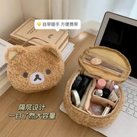 Fuzzy bear-themed makeup bags.