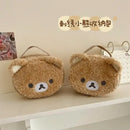 Two fuzzy bear-shaped bags.