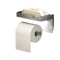 Silver toilet paper holder with shelf.