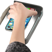 Toilet paper holder with phone shelf.