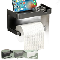 Toilet paper holder with shelf.