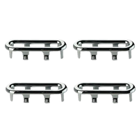 Four chrome oval trim pieces.