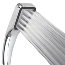 Chrome shower head with water flowing.