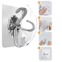 Rotating adhesive wall hook with installation instructions.