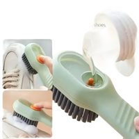 Green soap-dispensing cleaning brush.