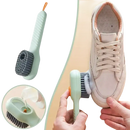 Shoe cleaning brush with soap dispenser.