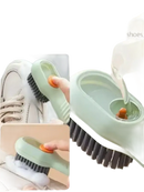 Soap dispensing cleaning brush.
