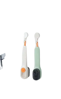 Two hanging cleaning brushes.